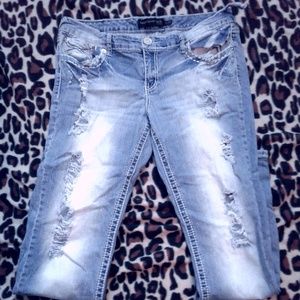 Women's holy blue jeans